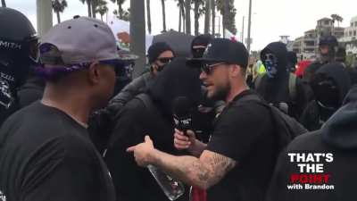 Journalist faces off with mob