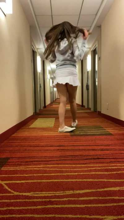 Busted [f]lashing in the hotel hallway