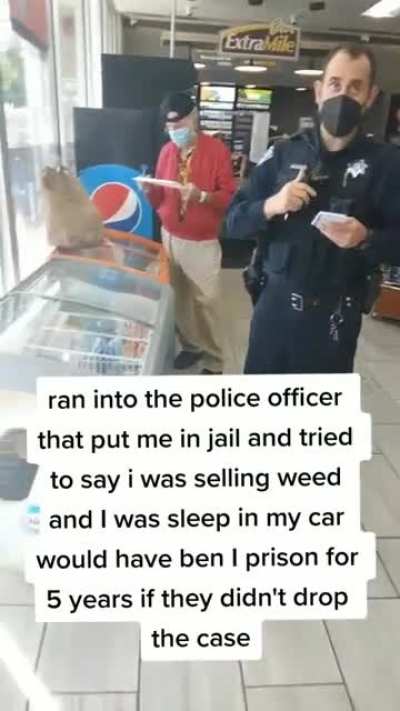 Man confronts a police officer who allegedly accused him of selling marijuana