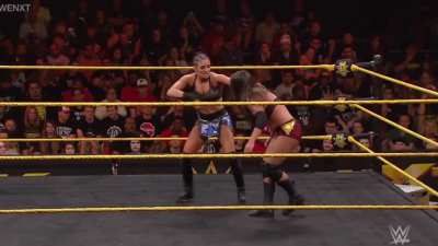 Sonya deville kicks and punches Rachel Evers right in the belly