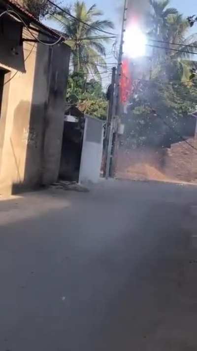Hanging fireworks on electric wires