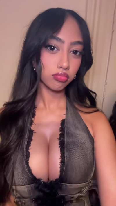 Innocent face but massive tits