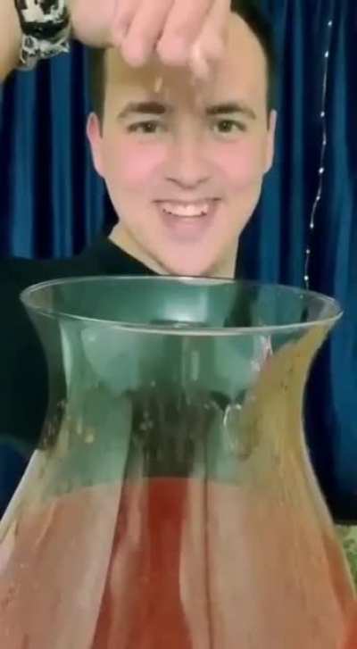 At making a drink using hot sauce