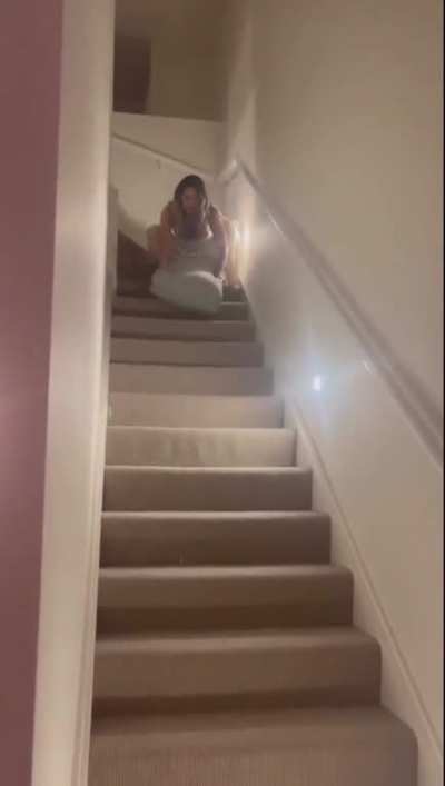 HMC while Trying to ride a cushion down a staircase