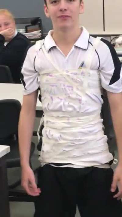 wrapped a friend in tape