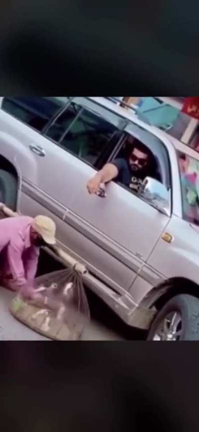 Catching birds mid-flight and giving them to the street merchant