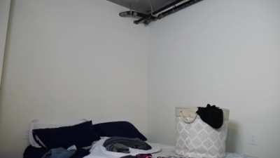 doing her laundry and shaking her ass