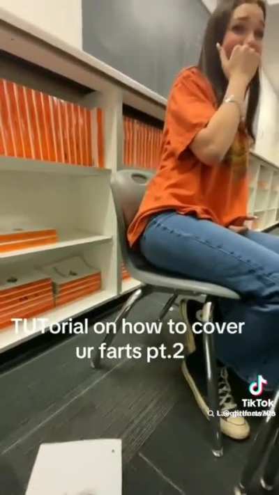 Girl covers her farts at school 