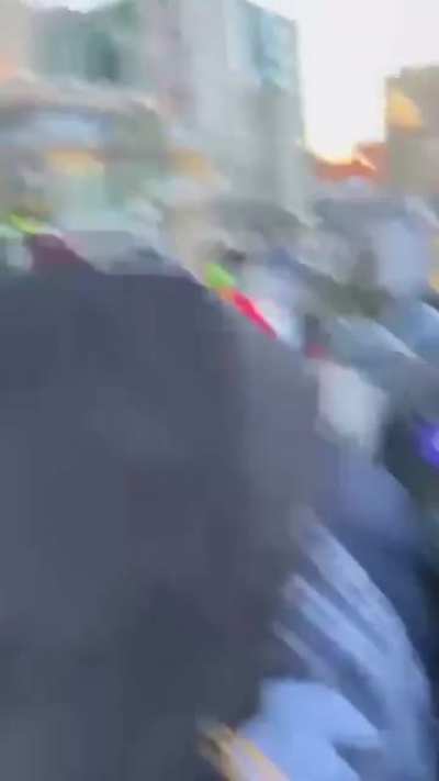 Ottawa Police charges through protesters on horseback.