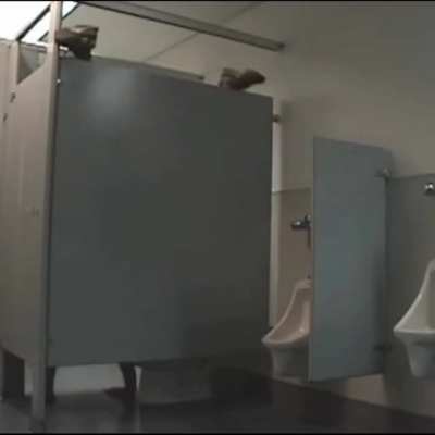 Jason Bourne takes a shit over the stall
