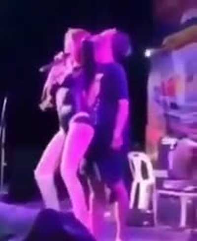 Man goes insane on stage and tries to commit a crime.