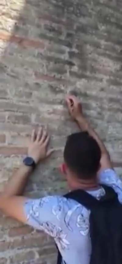 Carving "love note" into Rome's Colosseum