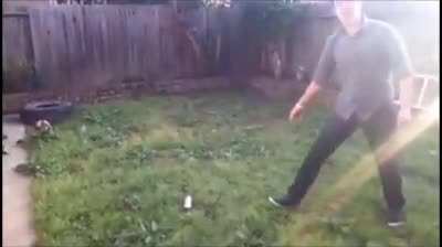Throwing a knife at a spray paint can