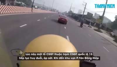 Car robber (red car) was being chased by traffic police and crased into a yard