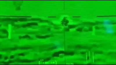An anti-tank missile launched from M2A2 Bradley collides with a bird