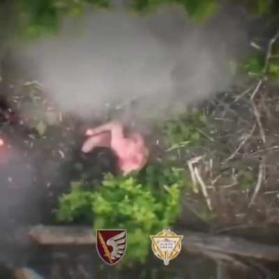 Crew of a disabled Russian turtle tank is on fire and later targeted by drone dropped munition.
