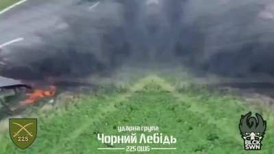 Drone operators of the Ukrainian 225th Assault Battalion's "Black Swan" unit drop grenades on Russian supply trucks in Kursk Oblast, Russia. 