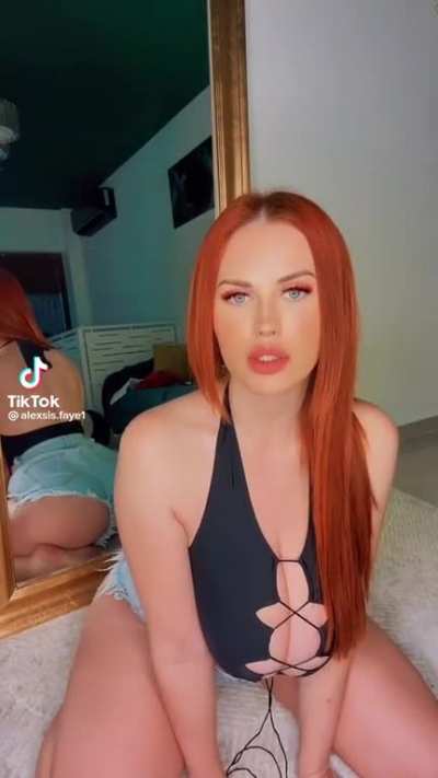 Perfect busty redhead