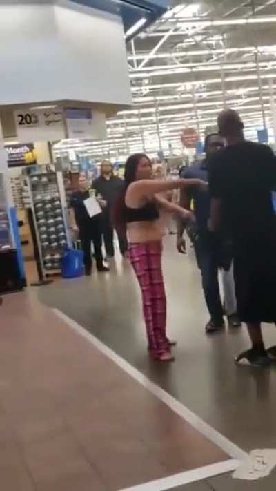 Woman has bizarre freak out in Walmart only to be carried out by a man after calling everyone the N-Word