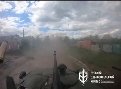 Russian Volunteer Corps (RDK) BTR-82 rolling near outskirts of the Volchansk town