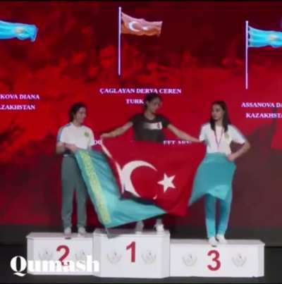 Turkish and Kazakhstani athletes argue about flags on the podium