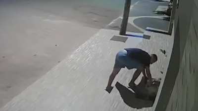 This guy with a small act of kindness towards this homeless dog