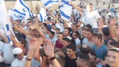 Israeli extremists dance and chant "Death to Arabs" at Damascus Gate after the Israeli police cleared the gate and its vicinity of Palestinians ahead of the far-right &lsquo;Flag March&rsquo; that was approved by the new Israeli government