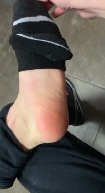 Sweaty gym shoe removal