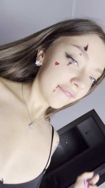 Animated eyes and a painted-on smile, my clown cosplay fantasy