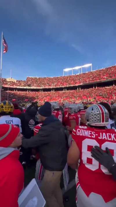 On field POV of OSU-Michigan post-game brawl that erupted due to Michigan planting a victory flag.