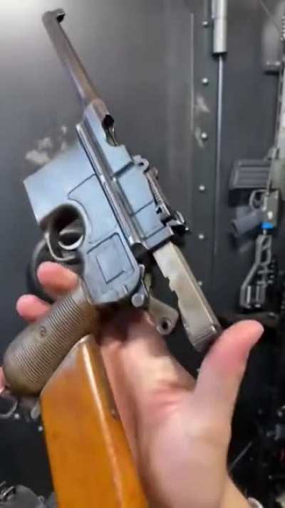 Mauser C96 Broomhandle in a wooden holster. Now that&rsquo;s German Engineering