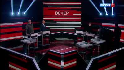 One of the guests on Russian propagandist Solovyov's TV show has literally fainted on "live TV" (possibly from cringe)