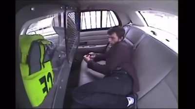 Magician vanishes from police car