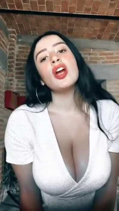 Letting the boys have a peek of her cleavage