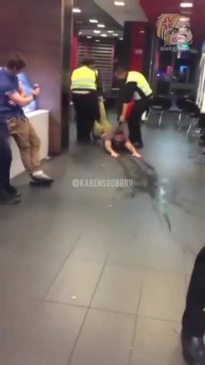 McDonald's piss covered customer dragged out of store.