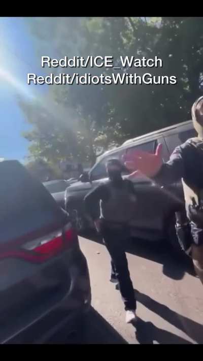 Fragile ICE coward immediately going for her gun