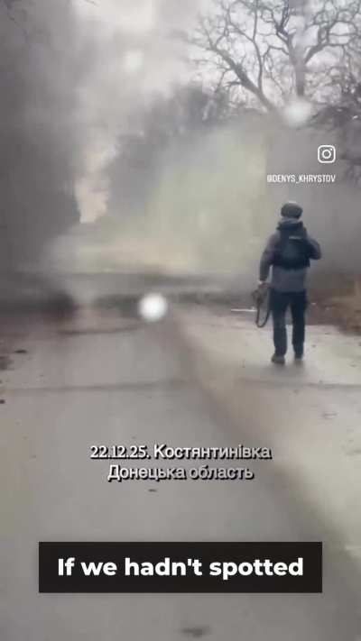 UA POV: Volunteers Denys Khrystov (known as &ldquo;The Dutchman&rdquo;) and Bogdan Zuyakov destroy a drone that had landed on the road while they were en route to an evacuation.