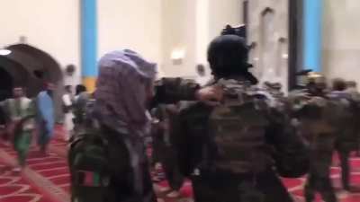 Taliban in their new tactical equipment
