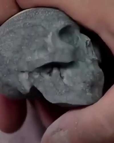 This guy carved a skull out of an 8-ball.