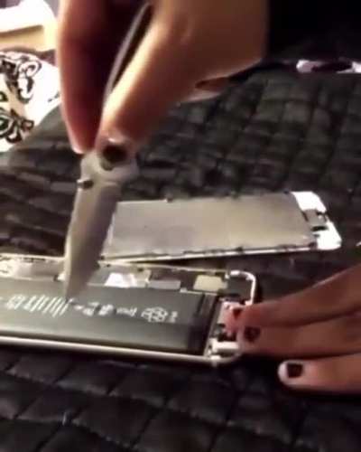 Kids doing surgery on a battery