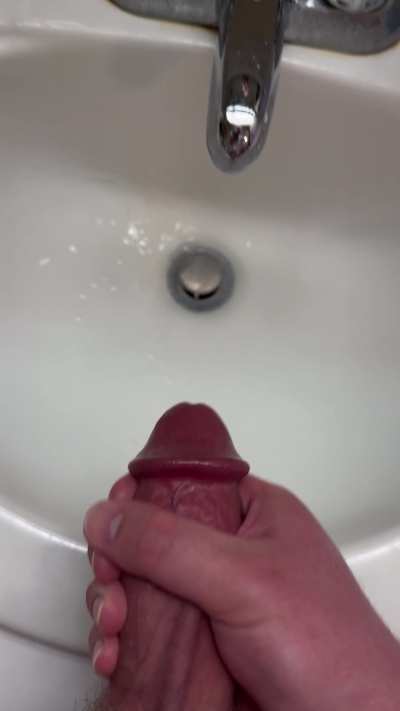 Spraying down the sink