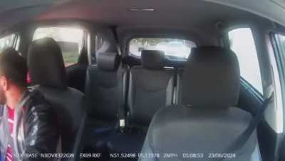 Guys in taxi get attacked by their rivals