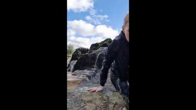 Posing on a wet rock next to a river, WCGW?