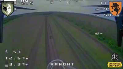 Ukrainian FPV drone attack on a Russian jeep carrying infantry (Music from source)
