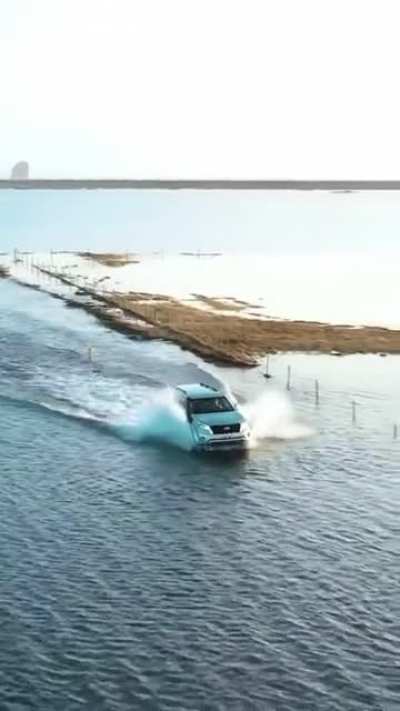 Would you Drive across this flooded road in Iceland?