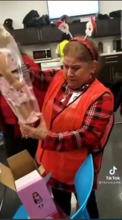 Positive freak out of kind human gesture. She receives a gift that she has never gotten.