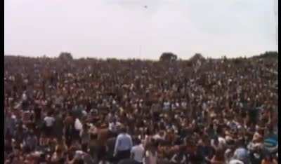Dairy farmer Max Yasgur, the man who agreed to host the 1969 Woodstock music festival on his farm, is seen here giving a speech to over 400,000 attendees.