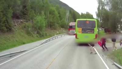 Kids cross the street without looking.
