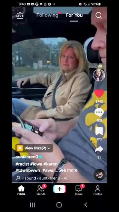 woman just wants insurance info. gets called a racial slur whe she doesn't know shes being recorded