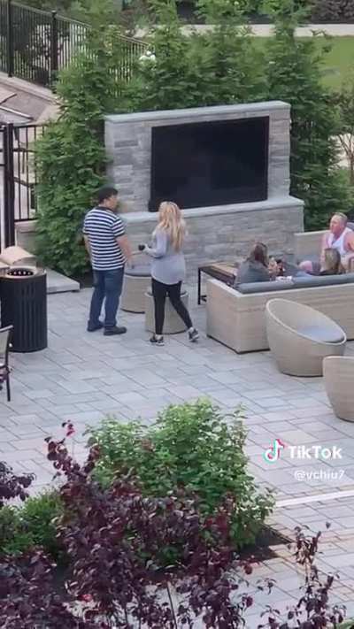 Lady yells at a man for asking for vaccine papers for her dog after his daughter was bit by it.